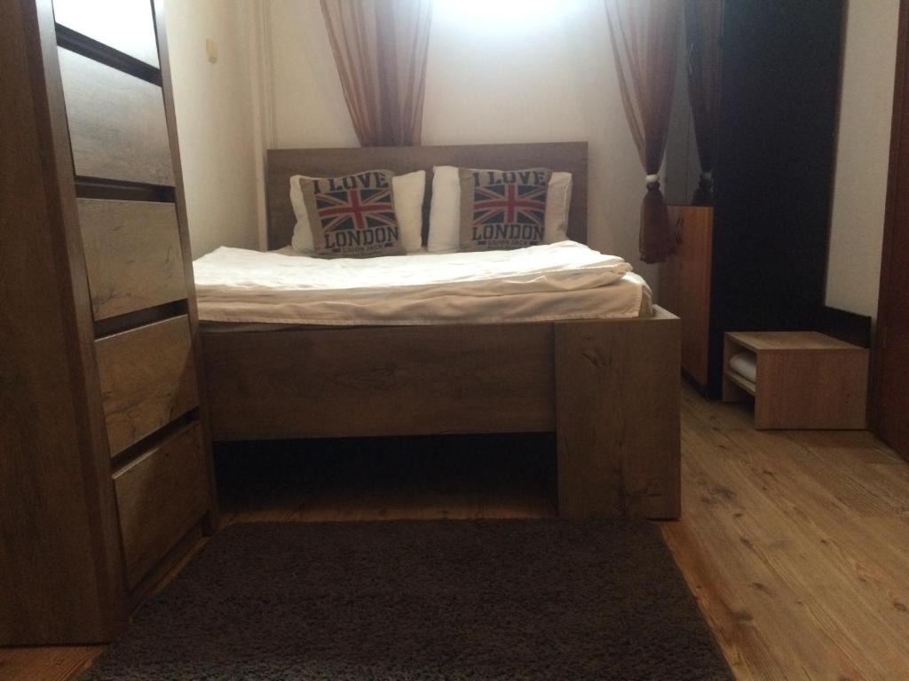 Postel nebo postele na pokoji v ubytování Studio Julius Constanta