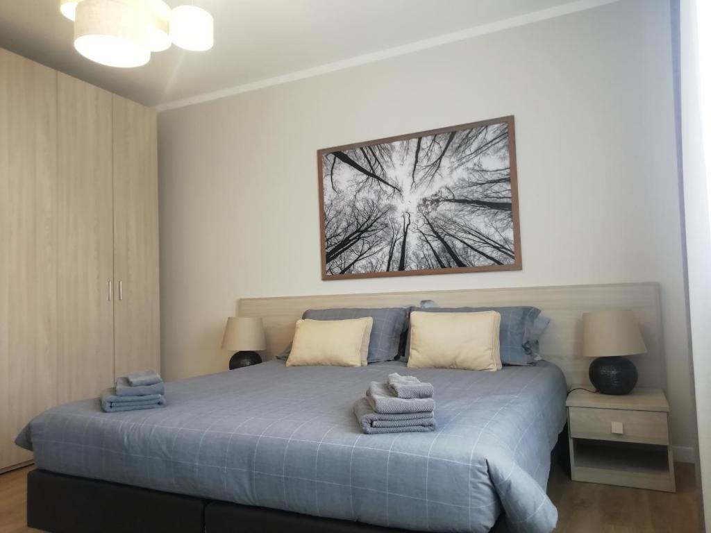 Łóżko lub łóżka w pokoju w obiekcie Cà Mocenigo Terrace