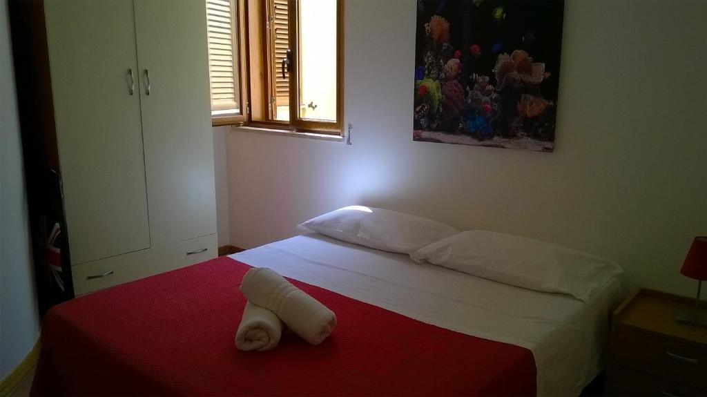 Ein Bett oder Betten in einem Zimmer der Unterkunft Le Rocche