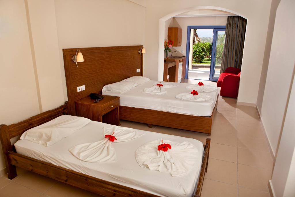 Postel nebo postele na pokoji v ubytování Hermes Hotel