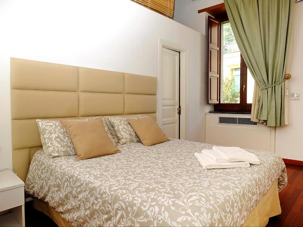 Postel nebo postele na pokoji v ubytování B&B Villa Elisa