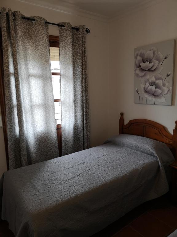 Postel nebo postele na pokoji v ubytování Pensión Venta Julián HCA01134
