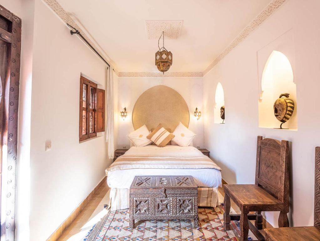 Postel nebo postele na pokoji v ubytování Riad Passali