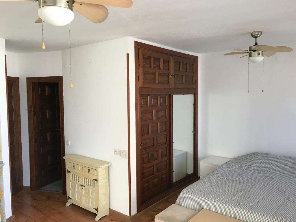Postel nebo postele na pokoji v ubytování Palm Beach 8th - La Carihuela