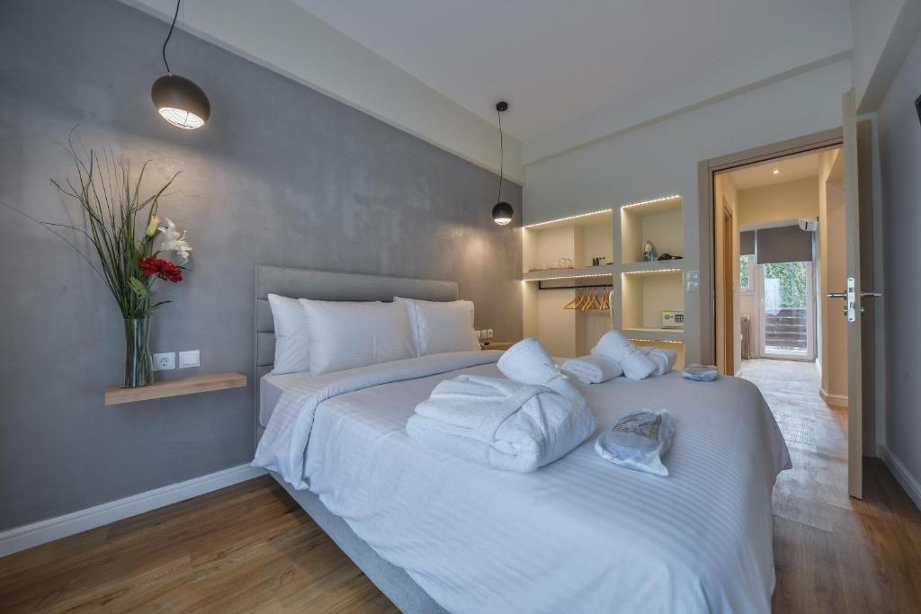 Voodi või voodid majutusasutuse A.P. Acropolis View Apartments toas