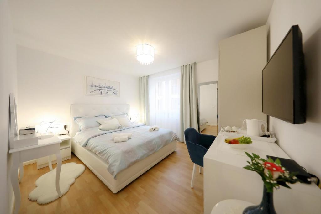 TV a/nebo společenská místnost v ubytování Rosita Deluxe Rooms