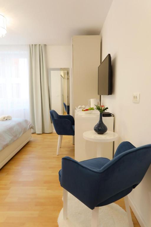 Postel nebo postele na pokoji v ubytování Rosita Deluxe Rooms