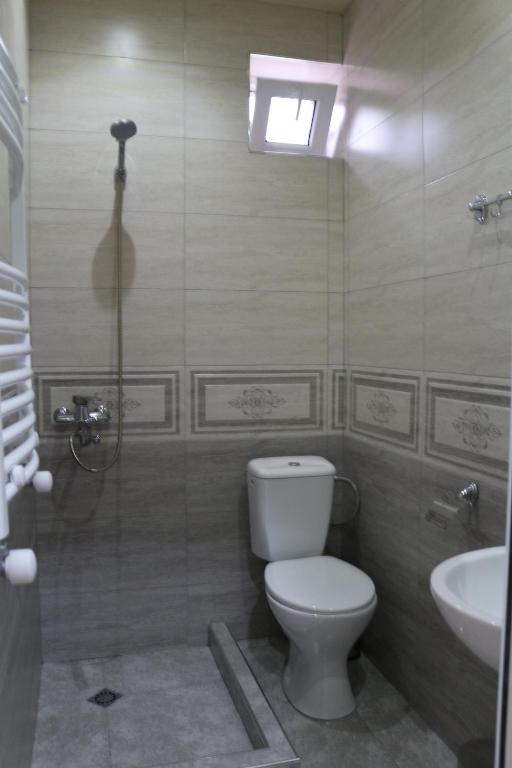 Koupelna v ubytování Guesthouse suja