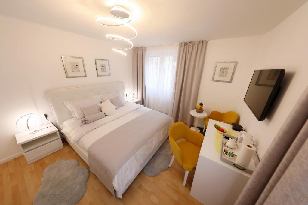 Postel nebo postele na pokoji v ubytování Rosita Deluxe Rooms