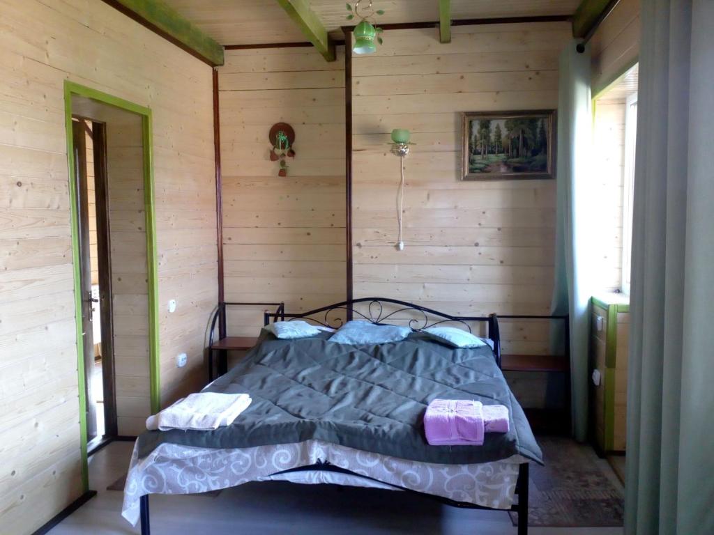 Postel nebo postele na pokoji v ubytování Rosinka