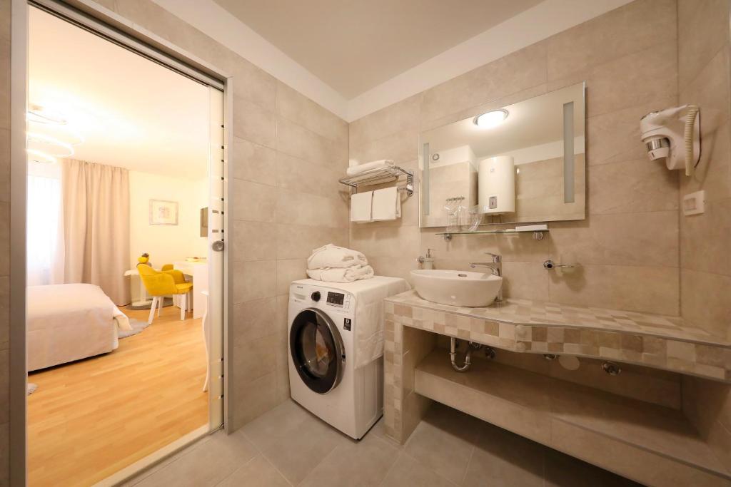 Koupelna v ubytování Rosita Deluxe Rooms