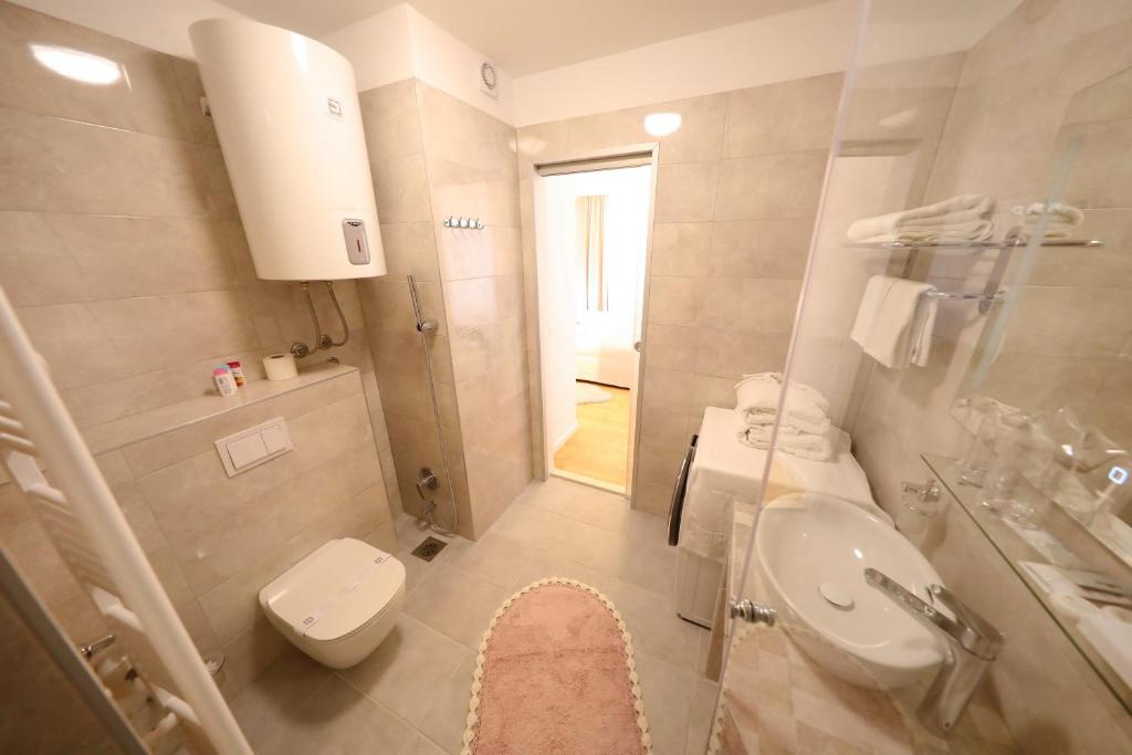 Koupelna v ubytování Rosita Deluxe Rooms