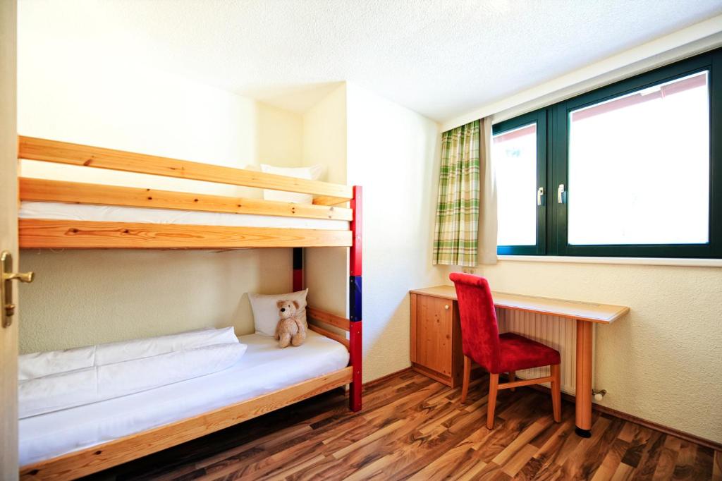 Posteľ alebo postele v izbe v ubytovaní Alp Resort Tiroler Adler