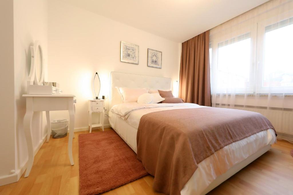 Postel nebo postele na pokoji v ubytování Rosita Deluxe Rooms