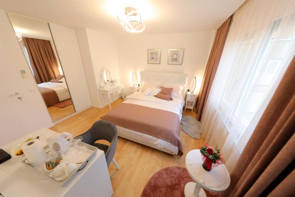 Postel nebo postele na pokoji v ubytování Rosita Deluxe Rooms