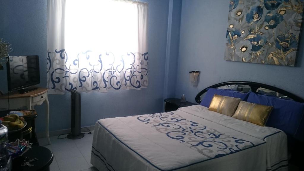 Postel nebo postele na pokoji v ubytování Habitación con baño privado