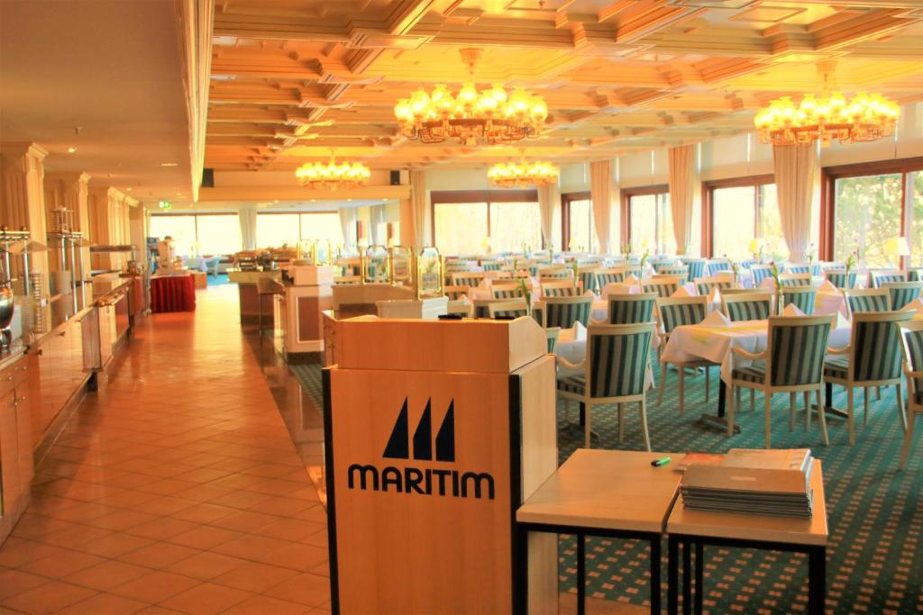 Restaurace v ubytování Strandappartement 715 im Plaza Premium Hotel