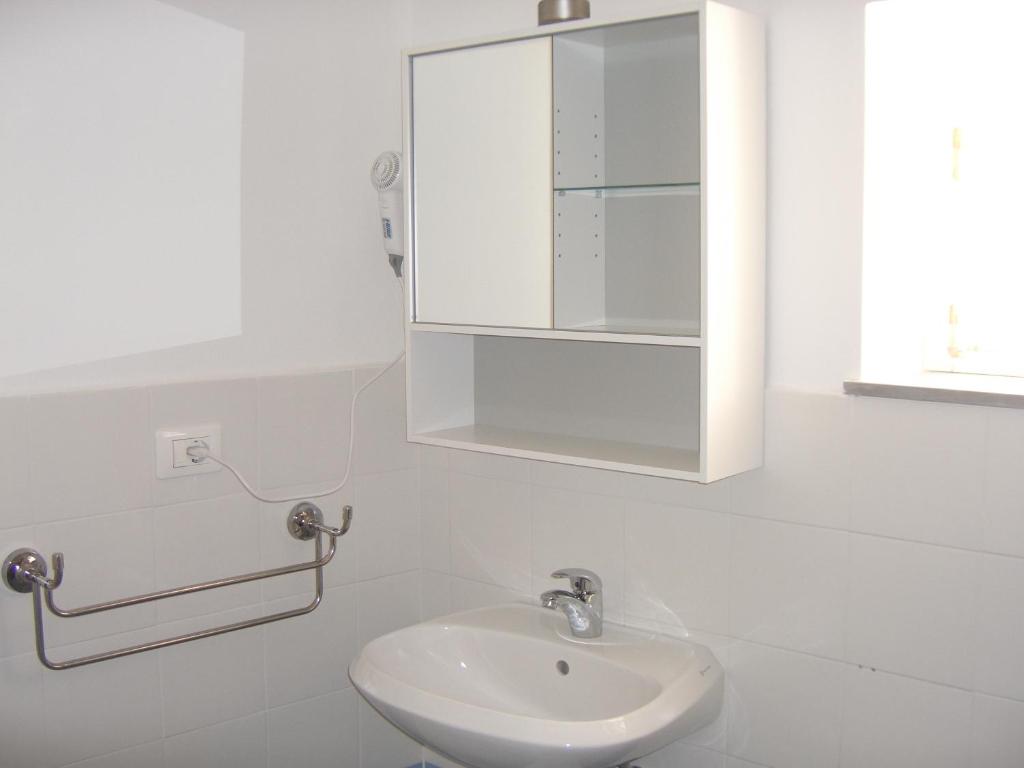 Koupelna v ubytování Hotel Paese Corvara