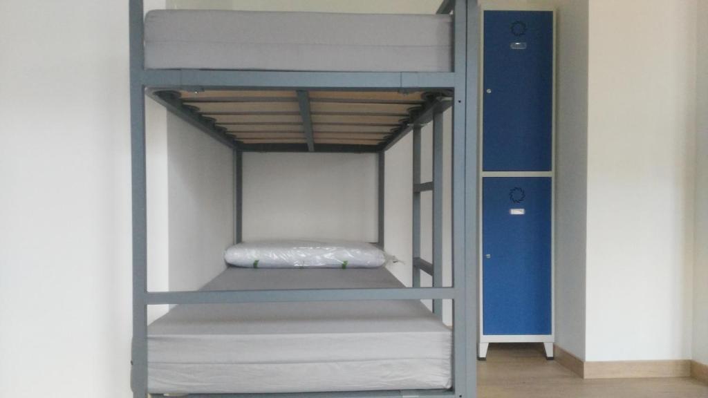Postel nebo postele na pokoji v ubytování Albergue de Benabarre-CALUMET