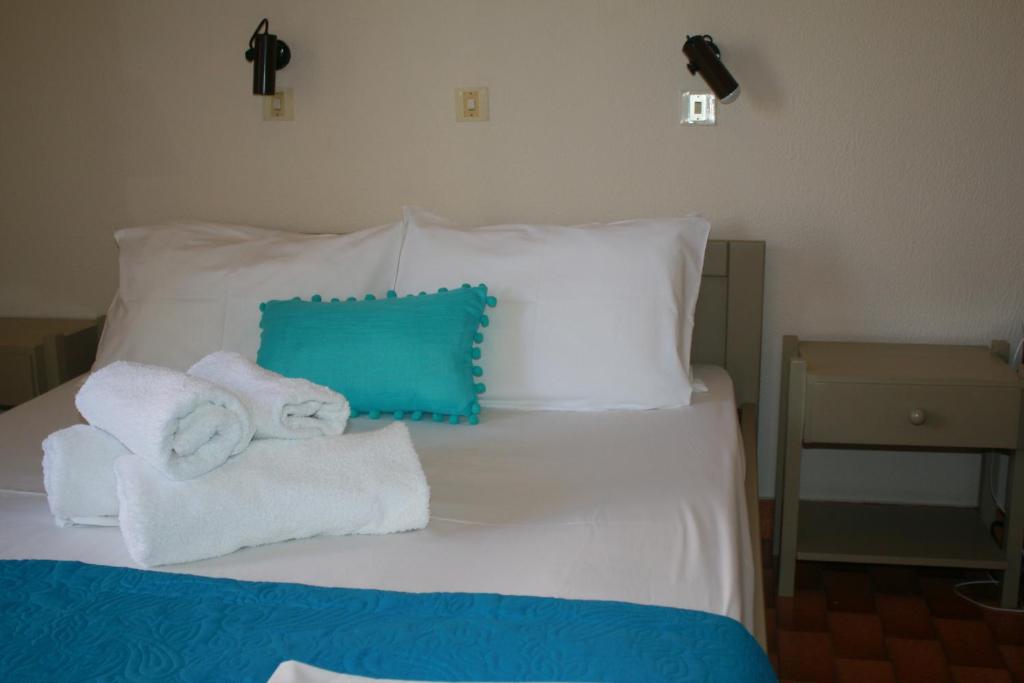 Postel nebo postele na pokoji v ubytování Argostoli Hotel