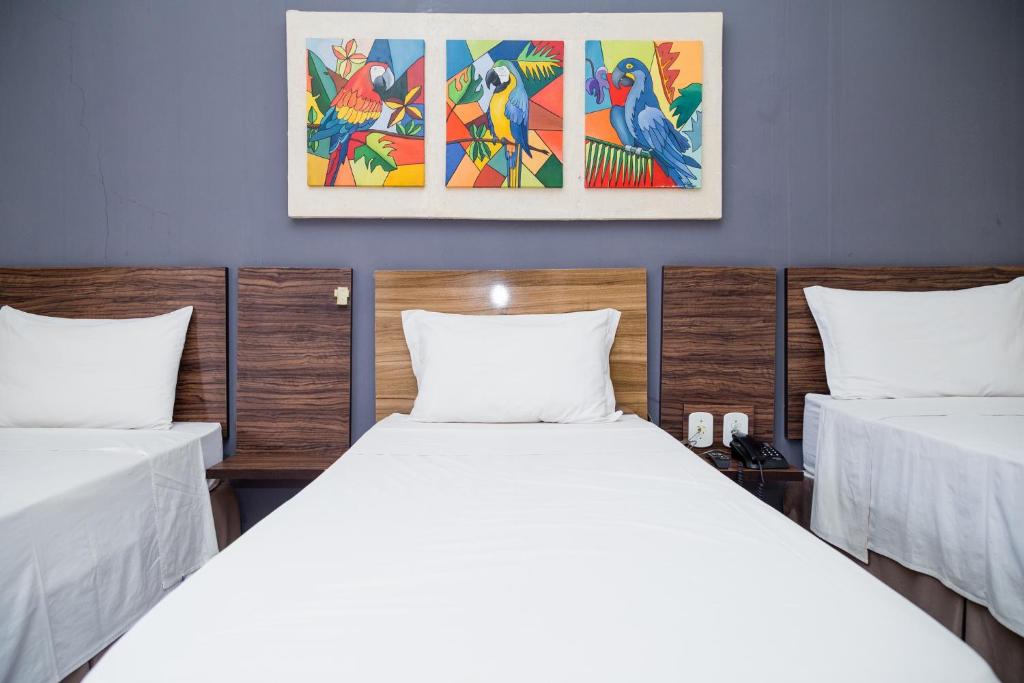 Postel nebo postele na pokoji v ubytování Hotel Kanaan