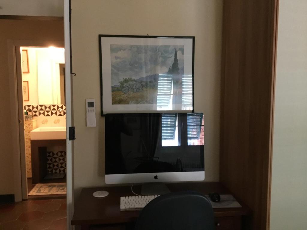 Telewizja i/lub zestaw kina domowego w obiekcie Casa Venezia