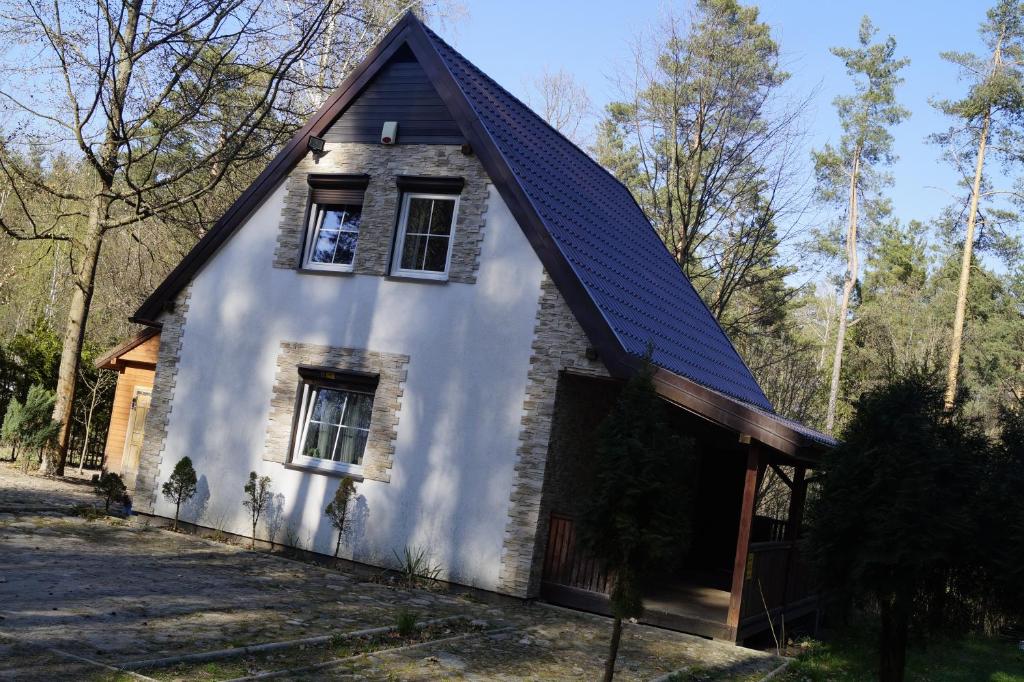 Fotografia z galérie ubytovania Uroczy domek do wynajęcia w Bogaczewie nad jeziorem Narie v destinácii Morąg