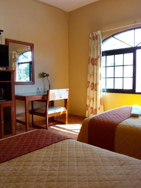 Postel nebo postele na pokoji v ubytování Hotel Virreynal