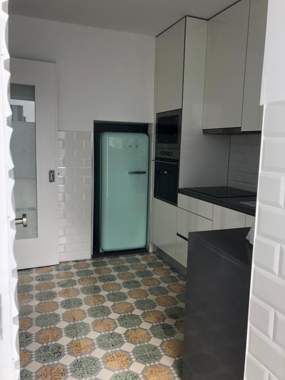 Kuchyň nebo kuchyňský kout v ubytování Sea Ria - T3 Family Apartment CENTRAL @ COSTA NOVA