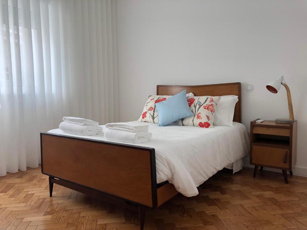Postel nebo postele na pokoji v ubytování Sea Ria - T3 Family Apartment CENTRAL @ COSTA NOVA