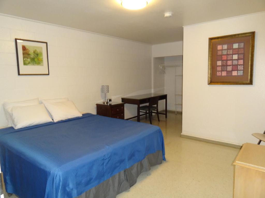 Postel nebo postele na pokoji v ubytování Tip Top Motel