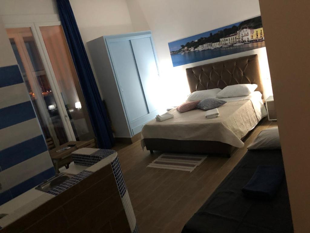 Postel nebo postele na pokoji v ubytování Casa Vacanze Riva Destra