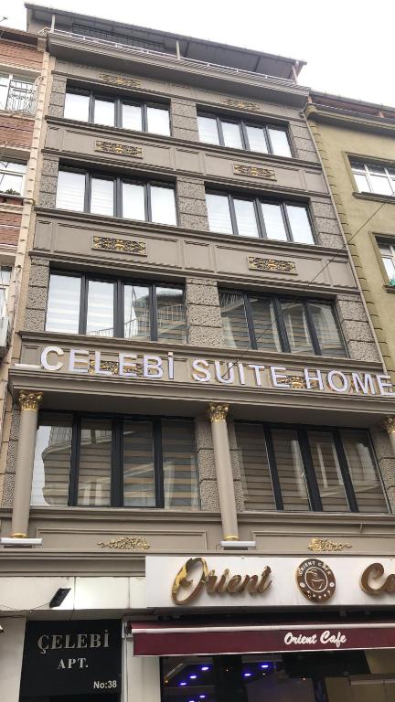 een gebouw met een bord aan de voorkant bij Çelebi Suite Home in Istanbul