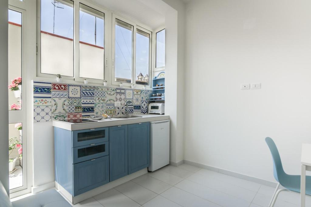 Kuchyň nebo kuchyňský kout v ubytování TERRAZZO SICILIANO