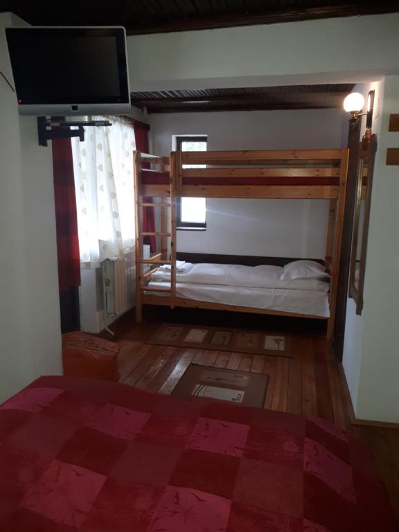 Postel nebo postele na pokoji v ubytování Pensiunea Faast