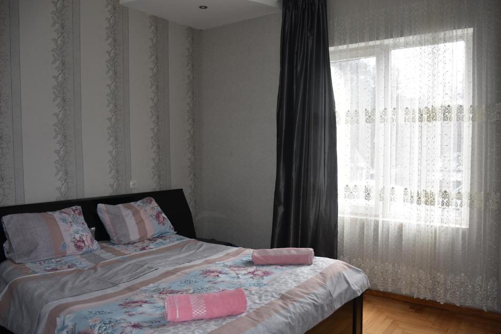 Postel nebo postele na pokoji v ubytování Guesthouse Natalia