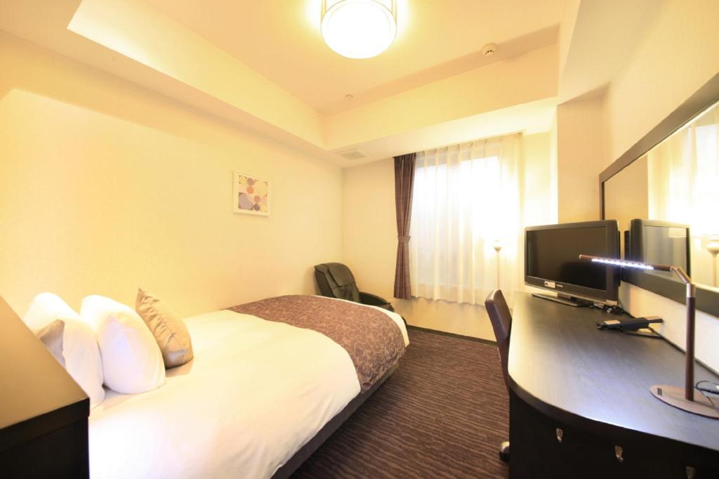 TV a/nebo společenská místnost v ubytování Hotel Coco Grand Kitasenju