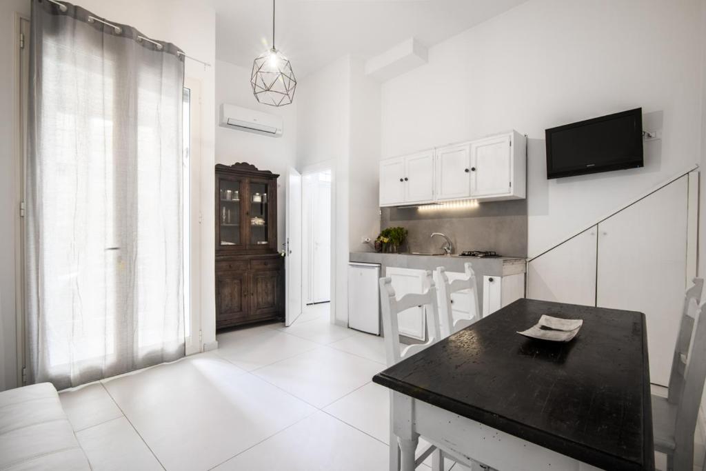 Kuchyň nebo kuchyňský kout v ubytování TERRAZZO SICILIANO