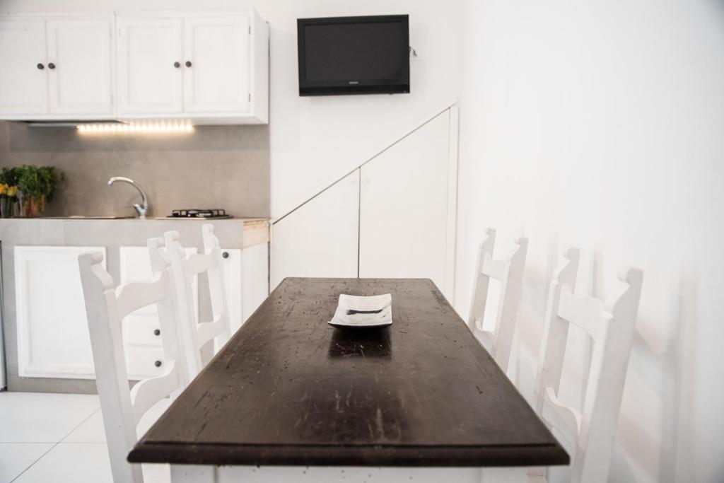 Kuchyň nebo kuchyňský kout v ubytování TERRAZZO SICILIANO