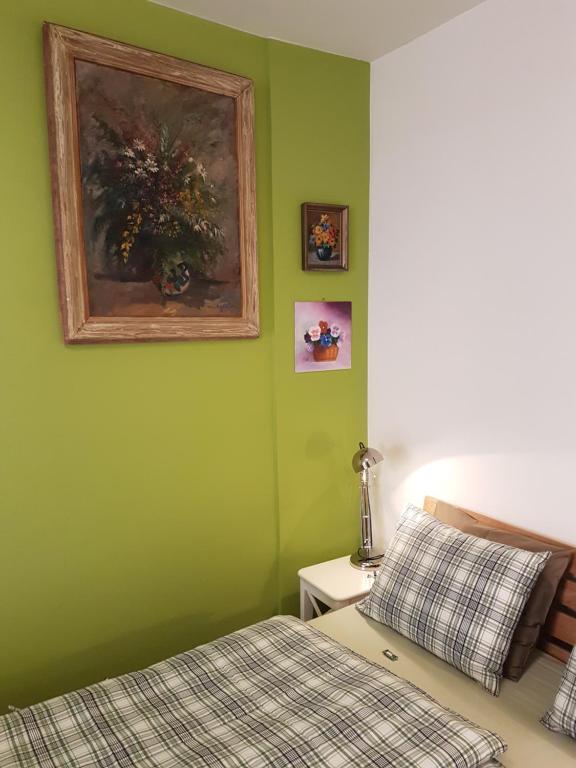 Postel nebo postele na pokoji v ubytování Garni Giacometti