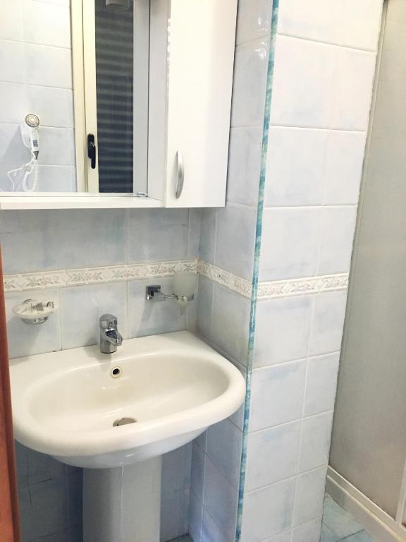 Koupelna v ubytování Hotel Due Pini Conte