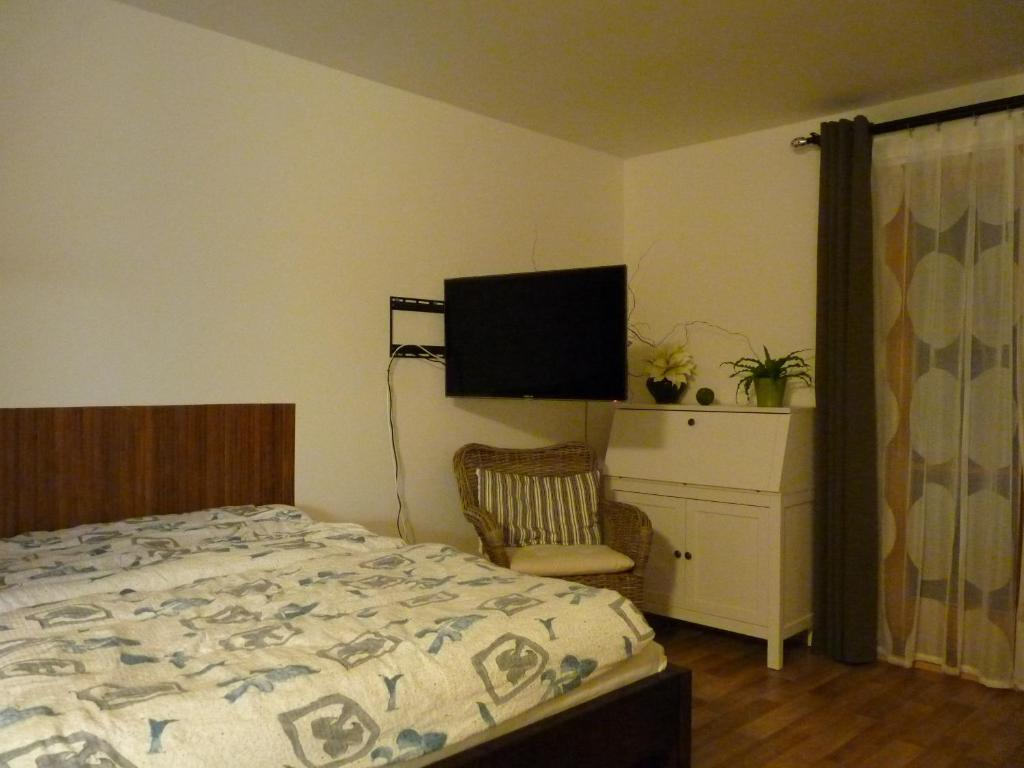 Postel nebo postele na pokoji v ubytování Apartmá Krkonoše