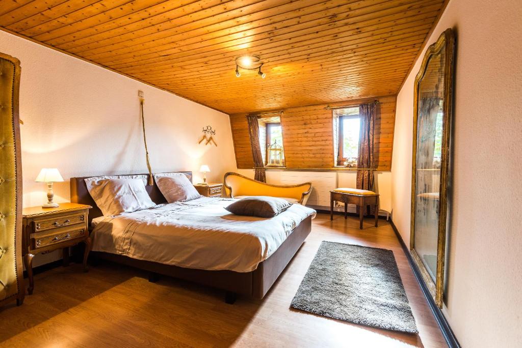 Postel nebo postele na pokoji v ubytování Le Gîte de Catherine