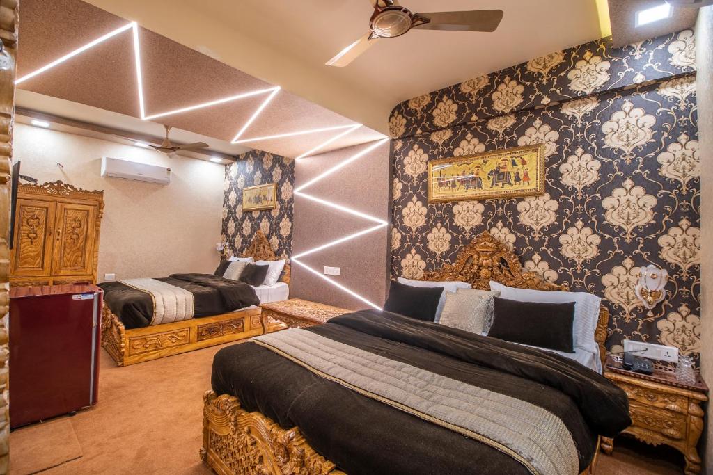 Postel nebo postele na pokoji v ubytování Onn Shelter Inn