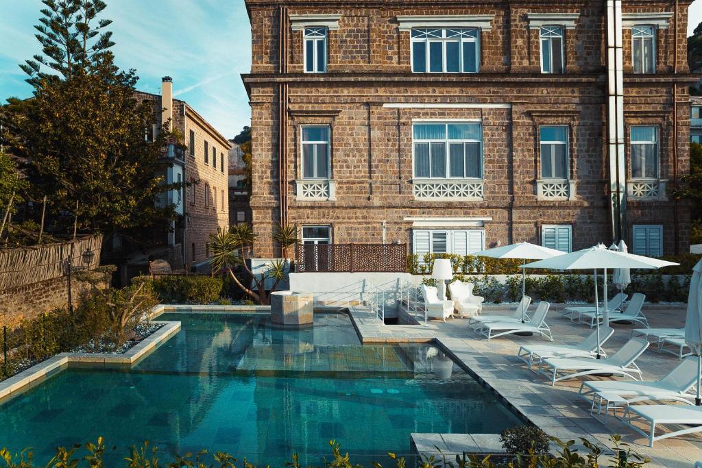 Bazén v ubytování Artis Domus Relais & Spa nebo v jeho okolí