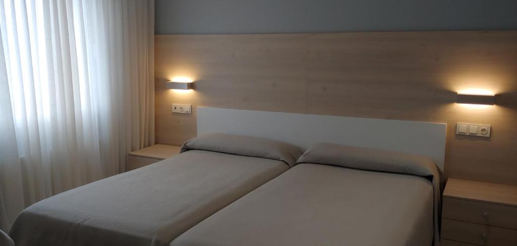 Postel nebo postele na pokoji v ubytování Hotel Goizalde