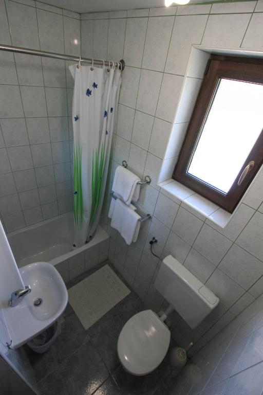 Koupelna v ubytování House Milan
