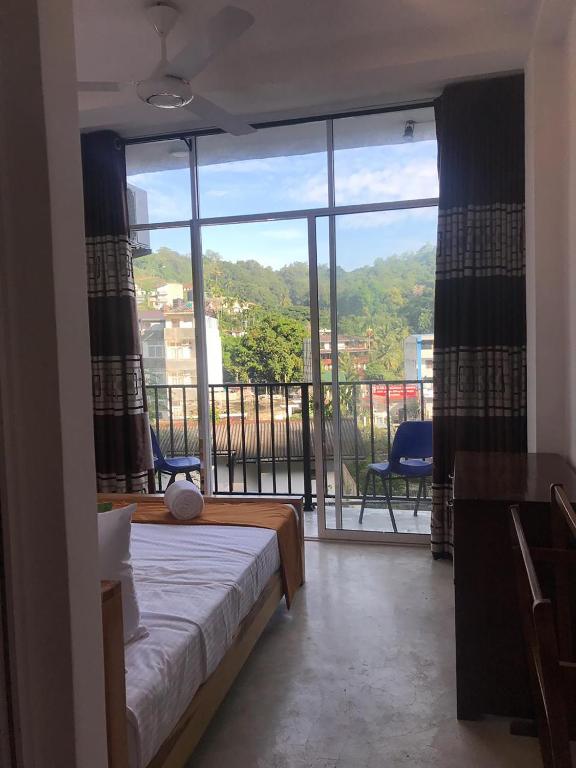 Postel nebo postele na pokoji v ubytování Lodge in 611