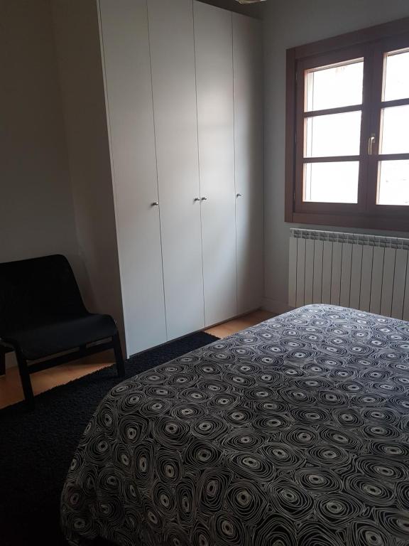 Postel nebo postele na pokoji v ubytování Apartamento Castillo de Arguedas