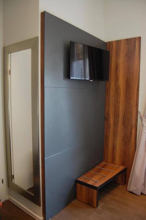 TV a/nebo společenská místnost v ubytování Apollo Hotel Vienna